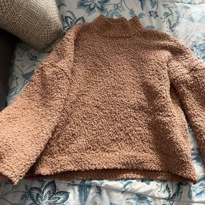 Cozy pink sweater gently used